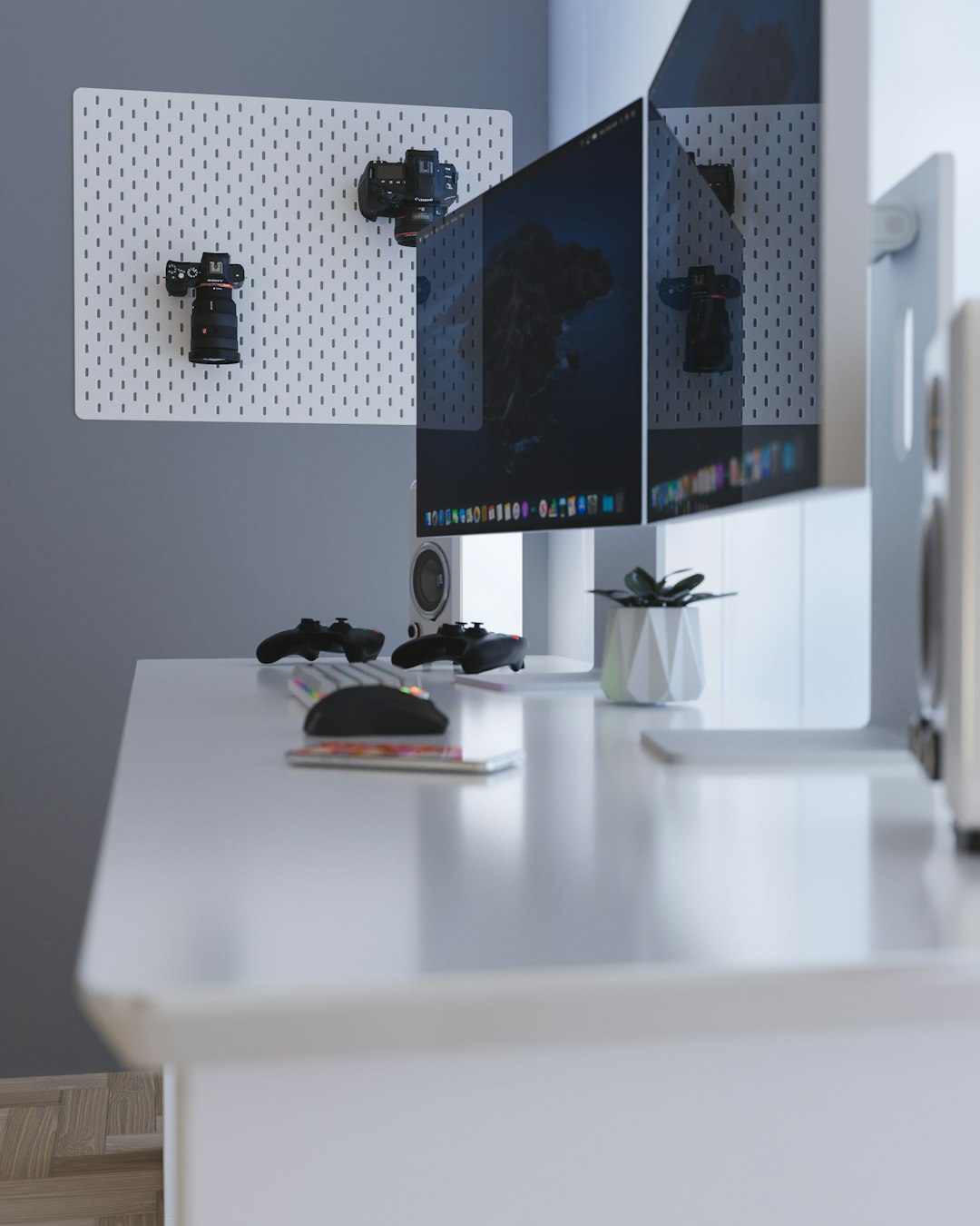 black-flat-screen-computer-monitor-on-white-desk-uxmzmcvgw6c
